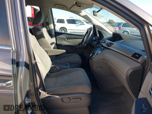 2016 Honda Odyssey SE with VIN 5FNRL5H32GB089740, listed as a IAAI auction lot 41402635 with 120,666 mi miles and . Bid and sale history available at DreamBid. Image 5.