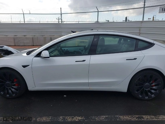 2022 Tesla Model 3 Performance with VIN 5YJ3E1EC0NF293544, listed as a IAAI auction lot 41451085 with 22,428 mi miles. Bid and sale history available at carsss.com. Image 15.