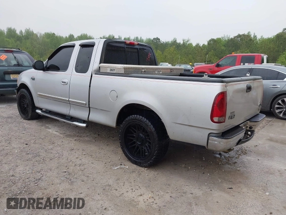 2003 Ford F-150 XL with VIN 1FTRX17253NA74389, listed as a IAAI auction lot 42072045 with 166,572 mi miles. Bid and sale history available at carsss.com. Image 3.
