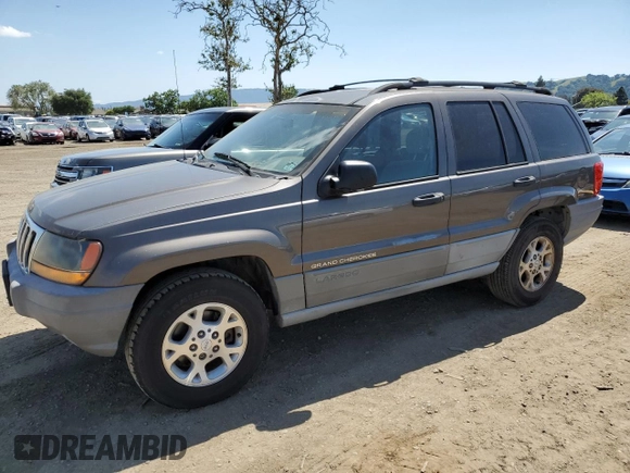 2000 Jeep Grand Cherokee Laredo with VIN 1J4G248S6YC333068, listed as a Copart auction lot 54972765 with 183,775 mi miles and Clean title. Bid and sale history available at DreamBid. Image 1.