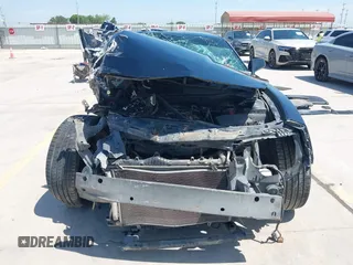 2014 Chevrolet Camaro LS z VIN 2G1FA1E32E9126043, wystawiony jako IAAI lot #42253189 z przebiegiem 104 457 mil mil oraz . Historia ofert i sprzedaży dostępna na DreamBid. Obrazek 12.