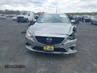 2014 Mazda 6 i Touring with VIN JM1GJ1V64E1147549, listed as a IAAI auction lot 42041025 with 124,400 mi miles and . Bid and sale history available at DreamBid. Image 12.