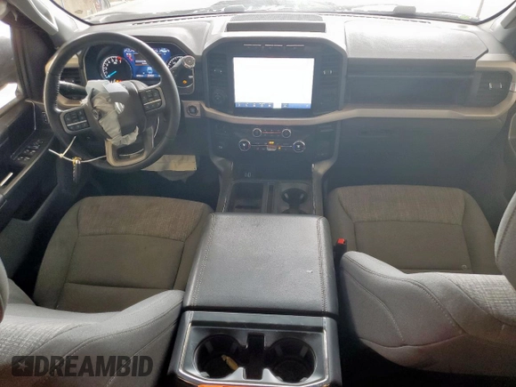 2021 Ford F-150 XL with VIN 1FTEW1CP1MFC04764, listed as a Copart auction lot 59572975 with 61,576 mi miles and Salvage title. Bid and sale history available at DreamBid. Image 8.