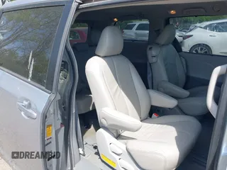 2014 Toyota Sienna XLE with VIN 5TDYK3DC9ES413283, listed as a IAAI auction lot 42091379 with 184,506 mi miles and . Bid and sale history available at DreamBid. Image 8.