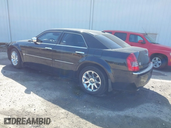2005 Chrysler 300 with VIN 2C3AA63H65H145122, listed as a IAAI auction lot 41847043 with 237,757 mi miles. Bid and sale history available at carsss.com. Image 3.