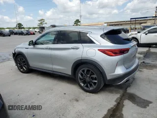 2019 Infiniti QX50 Luxe with VIN 3PCAJ5M10KF115123, listed as a Copart auction lot 57309395 with 122,978 mi miles and Salvage title. Bid and sale history available at DreamBid. Image 2.