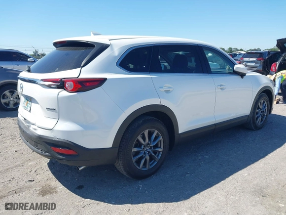 2020 Mazda CX-9 Touring with VIN JM3TCACY6L0403584, listed as a IAAI auction lot 41784589 with 55,328 mi miles. Bid and sale history available at carsss.com. Image 4.