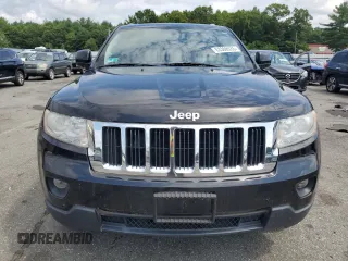2011 Jeep Grand Cherokee Laredo with VIN 1J4RR4GG5BC572376, listed as a Copart auction lot 63388535 with 135,995 mi miles and Clean title. Bid and sale history available at DreamBid. Image 5.