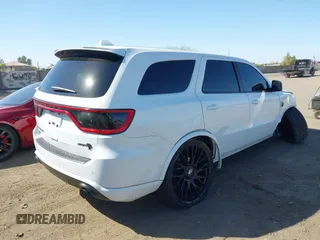 2021 Dodge Durango SRT Hellcat with VIN 1C4SDJH96MC692601, listed as a IAAI auction lot 41764490 with 27,434 mi miles and . Bid and sale history available at DreamBid. Image 4.