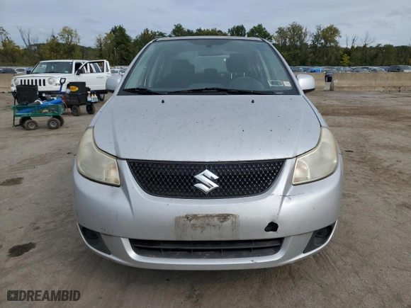 2010 Suzuki SX4 LE with VIN JS2YC5A21A6303767, listed as a Copart auction lot 72063074 with 114,140 mi miles and Clean Title. Bid and sale history available at carsss.com. Image 5.
