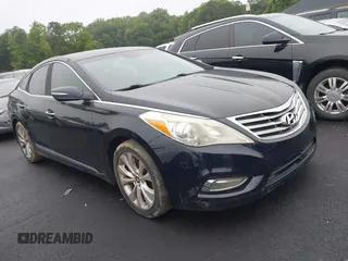2012 Hyundai Azera z VIN KMHFG4JG1CA121395, wystawiony jako IAAI lot #42355924 z przebiegiem 107 084 mil mil oraz . Historia ofert i sprzedaży dostępna na DreamBid. Obrazek 1.