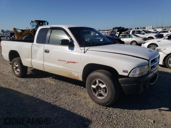 1999 Dodge Dakota SLT with VIN 1B7GG22Y6XS119274, listed as a Copart auction lot 46947005 with 264,537 mi miles and Salvage Title. Bid and sale history available at DreamBid. Image 4.