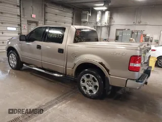 2004 Ford F-150 XLT with VIN 1FTPW14504KD59559, listed as a IAAI auction lot 41671633 with 196,328 mi miles. Bid and sale history available at carsss.com. Image 3.