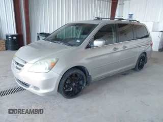 2006 Honda Odyssey EX-L z VIN 5FNRL387X6B413006, wystawiony jako IAAI lot #41687289 z przebiegiem 192 701 mil mil oraz . Historia ofert i sprzedaży dostępna na DreamBid. Obrazek 2.