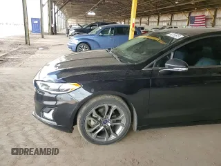 2020 Ford Fusion Titanium with VIN 3FA6P0RU7LR100411, listed as a Copart auction lot 56215615 with 108,457 mi miles and Salvage title. Bid and sale history available at DreamBid. Image 13.