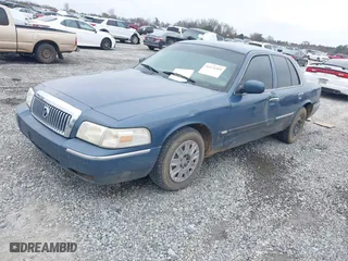 2007 Mercury Grand Marquis GS with VIN 2MEFM74V27X609128, listed as a IAAI auction lot 41474359 with 99,050 mi miles. Bid and sale history available at carsss.com. Image 2.
