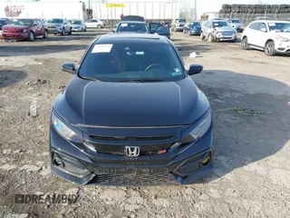 2020 Honda Civic Si z VIN 2HGFC1E57LH700157, wystawiony jako IAAI lot #41935665 z przebiegiem Nie podano mil oraz . Historia ofert i sprzedaży dostępna na DreamBid. Obrazek 11.