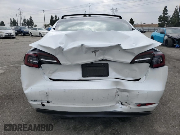 2021 Tesla Model 3 Standard Range Plus with VIN 5YJ3E1EA7MF087909, listed as a Copart auction lot 50942395 with 16,591 mi miles and Salvage Title. Bid and sale history available at carsss.com. Image 6.