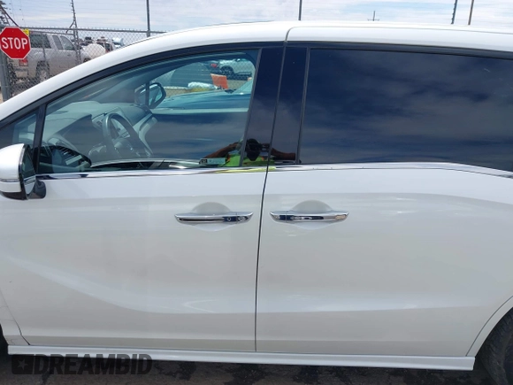 2019 Honda Odyssey Elite z VIN 5FNRL6H91KB110452, wystawiony jako IAAI lot #42630514 z przebiegiem 64 349 mil mil oraz . Historia ofert i sprzedaży dostępna na DreamBid. Obrazek 14.