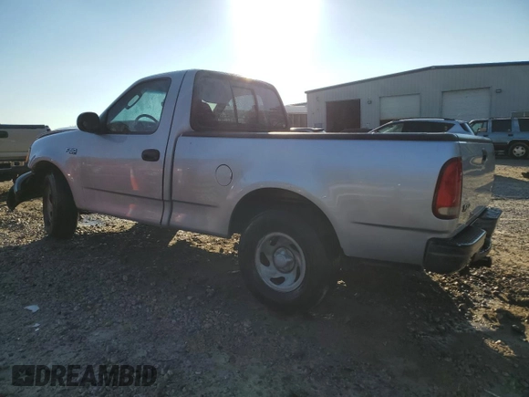 2002 Ford F-150 XL with VIN 1FTRF17202NB11513, listed as a Copart auction lot 85773084 with 120,443 mi miles and Salvage Title. Bid and sale history available at carsss.com. Image 2.