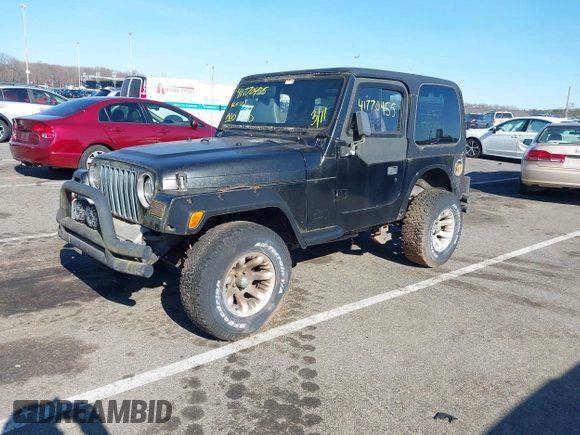 1997 Jeep Wrangler SE with VIN 1J4FY29P6VP438125, listed as a IAAI auction lot 41770455 with 163,001 mi miles. Bid and sale history available at carsss.com. Image 2.