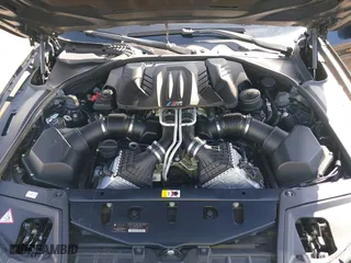 2013 BMW M5 with VIN WBSFV9C54DC772568, listed as a IAAI auction lot 41866486 with 99,072 mi miles. Bid and sale history available at carsss.com. Image 10.