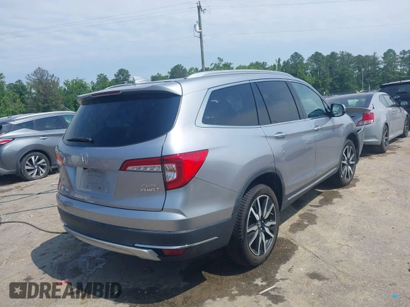 2019 Honda Pilot Elite with VIN 5FNYF6H08KB025449, listed as a IAAI auction lot 42450139 with 98,368 mi miles and . Bid and sale history available at DreamBid. Image 4.
