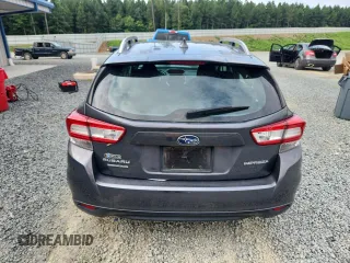 2018 Subaru Impreza Premium with VIN 4S3GTAD64J3715454, listed as a Copart auction lot 64798345 with 63,467 mi miles and Salvage title. Bid and sale history available at DreamBid. Image 6.