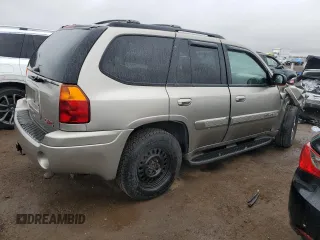 2002 GMC Envoy SLT with VIN 1GKDT13S222296226, listed as a Copart auction lot 51599295 with 148,653 mi miles and Salvage Title. Bid and sale history available at carsss.com. Image 3.