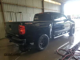 2014 Chevrolet Silverado 1500 High Country with VIN 3GCUKTEC7EG411981, listed as a Copart auction lot 57147835 with 158,571 mi miles and Clean Title. Bid and sale history available at DreamBid. Image 3.