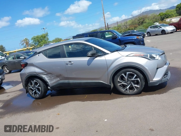 2018 Toyota C-HR XLE z VIN NMTKHMBX5JR009504, wystawiony jako IAAI lot #41776136 z przebiegiem 63 795 mil mil oraz . Historia ofert i sprzedaży dostępna na DreamBid. Obrazek 13.