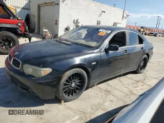 2002 BMW 7 Series 745i with VIN WBAGL634X2DP57617, listed as a Copart auction lot 74073604 with 153,666 mi miles and Clean Title. Bid and sale history available at DreamBid. Image 1.
