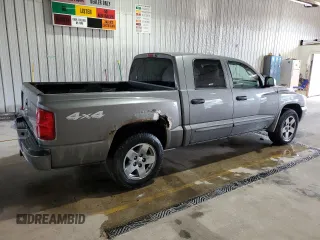 2005 Dodge Dakota SLT z VIN 1D7HW48N95S166589, wystawiony jako Copart lot #54868565 z przebiegiem 228 682 mil mil oraz Szkoda całkowita • Salvage title. Historia ofert i sprzedaży dostępna na DreamBid. Obrazek 3.