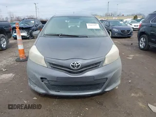 2013 Toyota Yaris L with VIN JTDJTUD30DD568688, listed as a IAAI auction lot 41665697 with 174,007 mi miles. Bid and sale history available at carsss.com. Image 12.