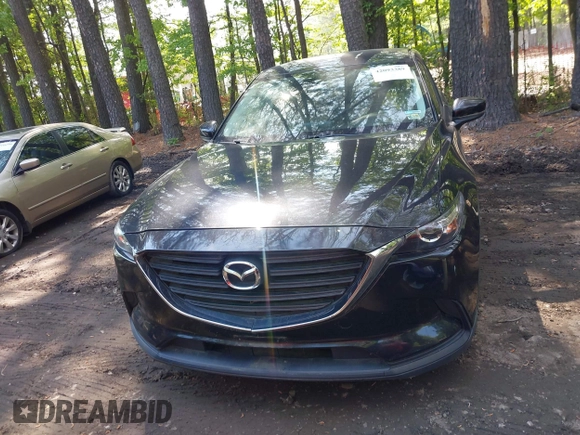 2016 Mazda CX-9 Sport with VIN JM3TCABY8G0112981, listed as a IAAI auction lot 42093389 with 106,384 mi miles. Bid and sale history available at carsss.com. Image 12.