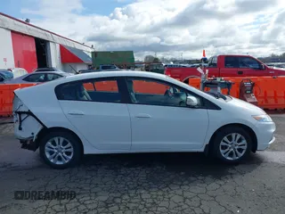 2012 Honda Insight EX z VIN JHMZE2H76CS005510, wystawiony jako IAAI lot #41793802 z przebiegiem 142 178 mil mil oraz . Historia ofert i sprzedaży dostępna na DreamBid. Obrazek 14.