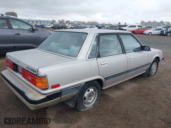 1985 Toyota Camry z VIN JT2SV16E9F0351378, wystawiony jako IAAI lot #42194705 z przebiegiem 192 476 mil mil oraz . Historia ofert i sprzedaży dostępna na DreamBid. Obrazek 4.