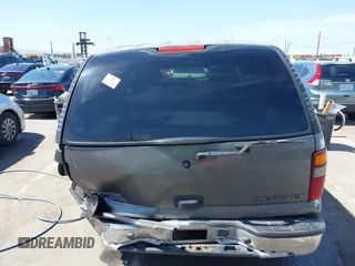 2002 Chevrolet Tahoe LS z VIN 1GNEC13V92R305304, wystawiony jako IAAI lot #41851210 z przebiegiem Nie podano mil oraz . Historia ofert i sprzedaży dostępna na DreamBid. Obrazek 16.