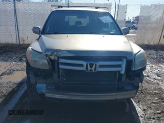 2007 Honda Pilot EX with VIN 2HKYF184X7H534943, listed as a IAAI auction lot 41818741 with 220,151 mi miles. Bid and sale history available at carsss.com. Image 6.