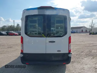 2021 Ford Transit Cargo with VIN 1FTBR1C85MKA19997, listed as a IAAI auction lot 41431285 with 61,158 mi miles and . Bid and sale history available at DreamBid. Image 16.