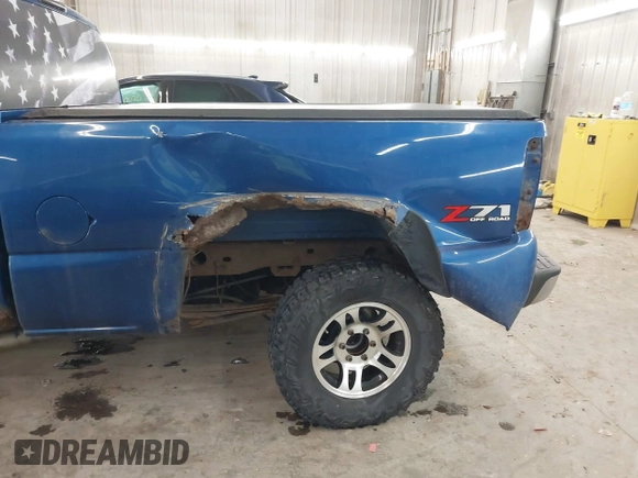 2003 Chevrolet Silverado 1500 with VIN 2GCEK19T931236982, listed as a IAAI auction lot 41178535 with 144,996 mi miles. Bid and sale history available at carsss.com. Image 6.