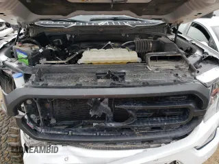 2021 Ford F-150 XL with VIN 1FTFW1E51MFB62435, listed as a Copart auction lot 54403394 with 0 mi miles and Salvage Title. Bid and sale history available at carsss.com. Image 11.