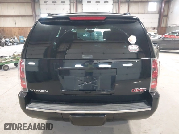 2013 GMC Yukon Denali with VIN 1GKS2EEF0DR105804, listed as a IAAI auction lot 42028402 with 121,054 mi miles. Bid and sale history available at carsss.com. Image 16.