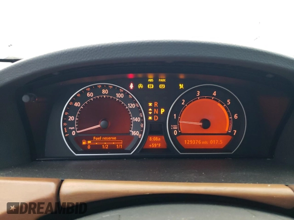 2006 BMW 7 Series 750i with VIN WBAHL83586DT05258, listed as a Copart auction lot 77033744 with 129,376 mi miles and Salvage Title. Bid and sale history available at DreamBid. Image 9.