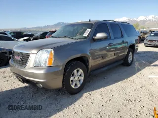 2014 GMC Yukon XL SLT with VIN 1GKS2KE7XER220161, listed as a Copart auction lot 54106865 with 169,583 mi miles and Salvage Title. Bid and sale history available at carsss.com. Image 1.