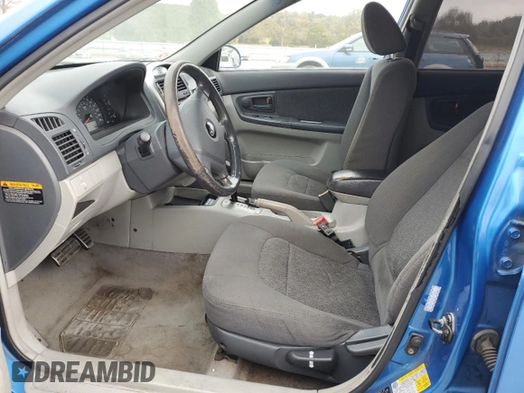 2006 Kia Spectra with VIN KNAFE162X65259727, listed as a Copart auction lot 75470994 with 0 mi miles and Salvage Title. Bid and sale history available at carsss.com. Image 7.
