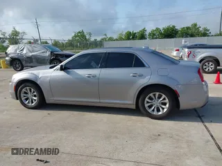 2016 Chrysler 300 Anniversary Edition with VIN 2C3CCAAG9GH211875, listed as a IAAI auction lot 42052083 with 209,251 mi miles and . Bid and sale history available at DreamBid. Image 14.