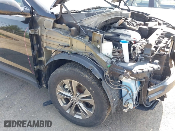 2014 Hyundai Santa Fe with VIN 5XYZUDLB9EG187420, listed as a IAAI auction lot 42369989 with 181,713 mi miles and . Bid and sale history available at DreamBid. Image 20.
