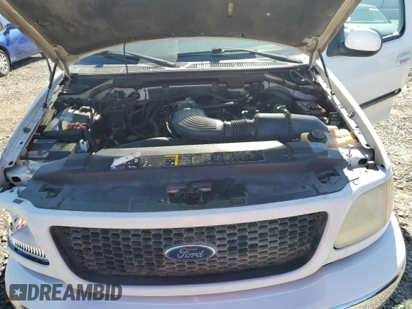 2001 Ford F-150 XL with VIN 1FTRF18L41NB60977, listed as a Copart auction lot 54933785 with 238,700 mi miles and Salvage title. Bid and sale history available at DreamBid. Image 11.