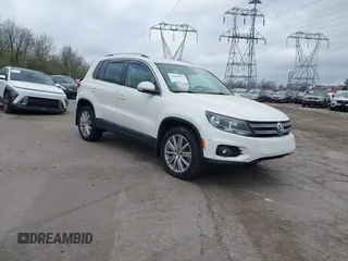 2012 Volkswagen Tiguan S z VIN WVGBV7AX2CW571145, wystawiony jako IAAI lot #41848073 z przebiegiem 11 421 mil mil oraz . Historia ofert i sprzedaży dostępna na DreamBid. Obrazek 1.